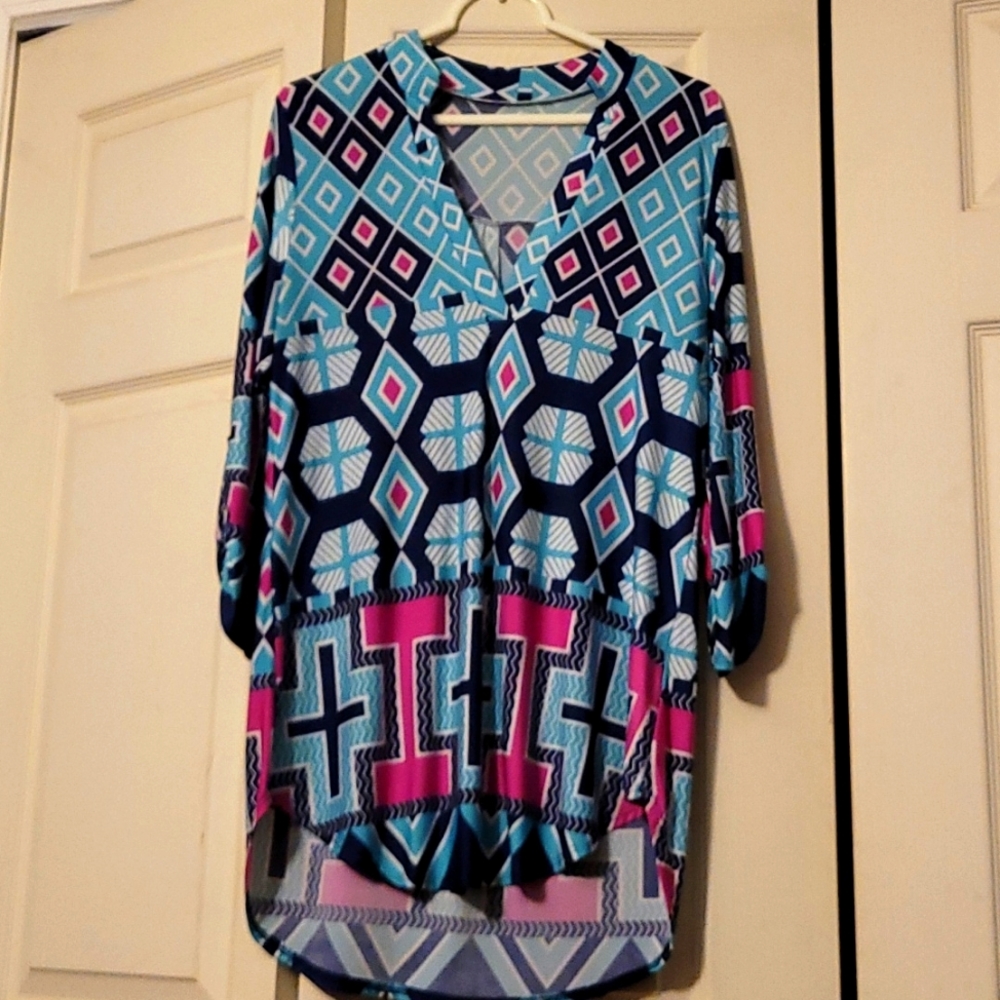 Medium, plunging neck line, stretchy, blues/pink